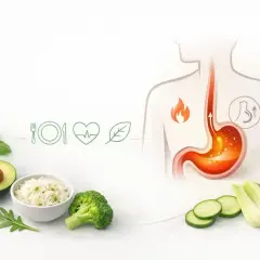 Ilustracja żołądka z płomieniem, ikonki diety i zdrowia, awokado, ryż, brokuły, ogórek, koper.